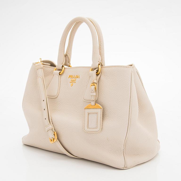 Prada, a 'Vitello Daino Tote' bag.