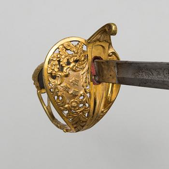 A second half of the 19th Swedish  century sabre with scabbard.