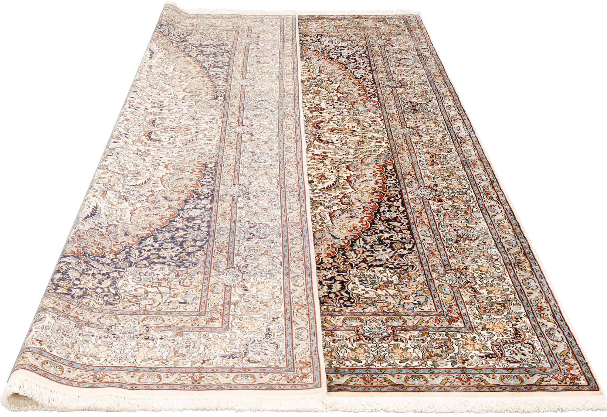A silk Kashmir carpet, approx. 300 x 200 cm.