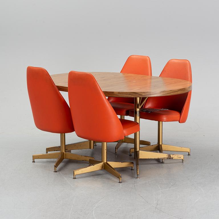 A dining table with four chairs, Walter of Wabash, table dated 1960.
