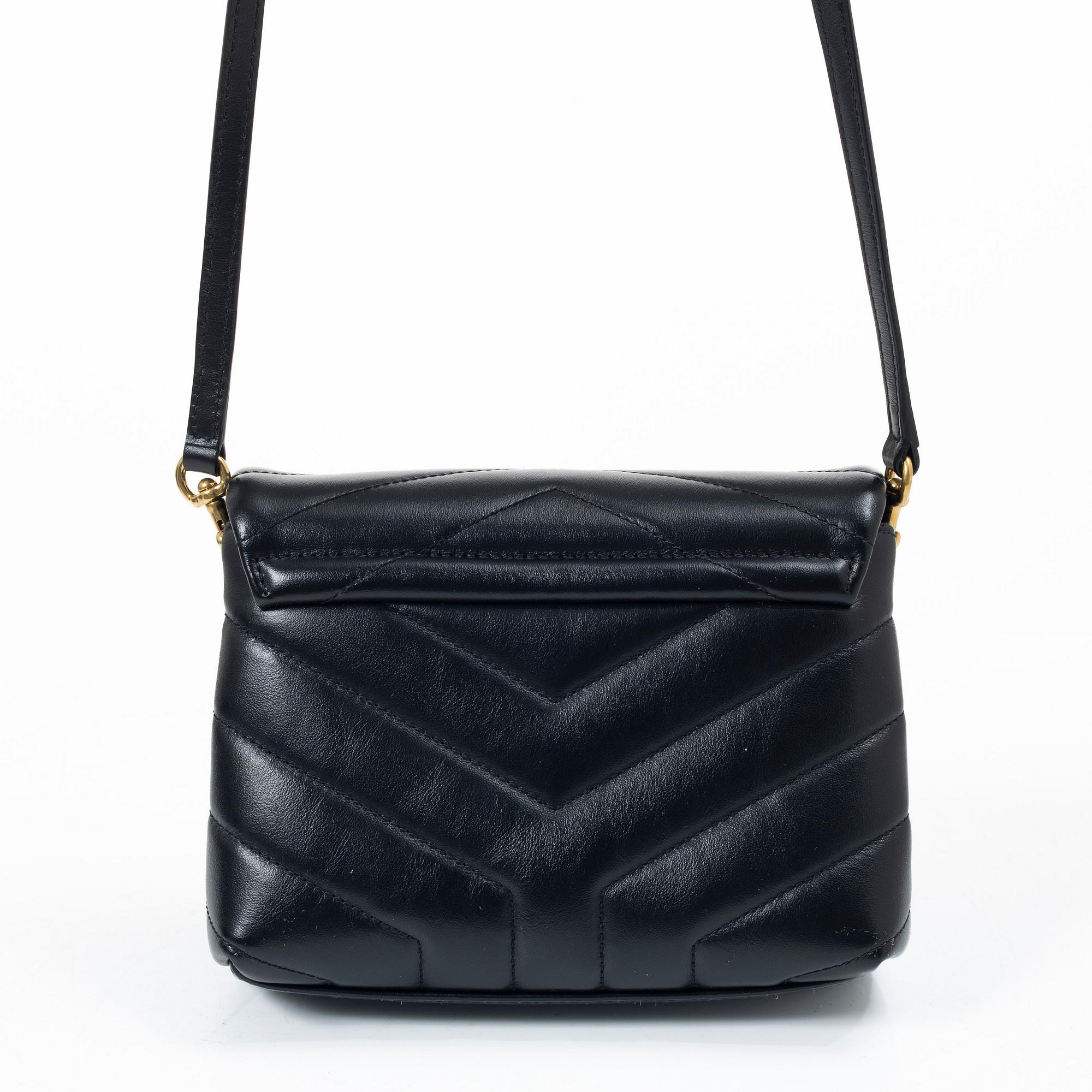 Yves Saint Laurent, a sholder bag.