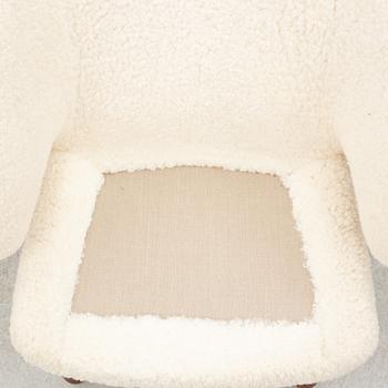 Finn Juhl, a' Pelican Chair' armchair, House of Finn Juhl, Denmark.