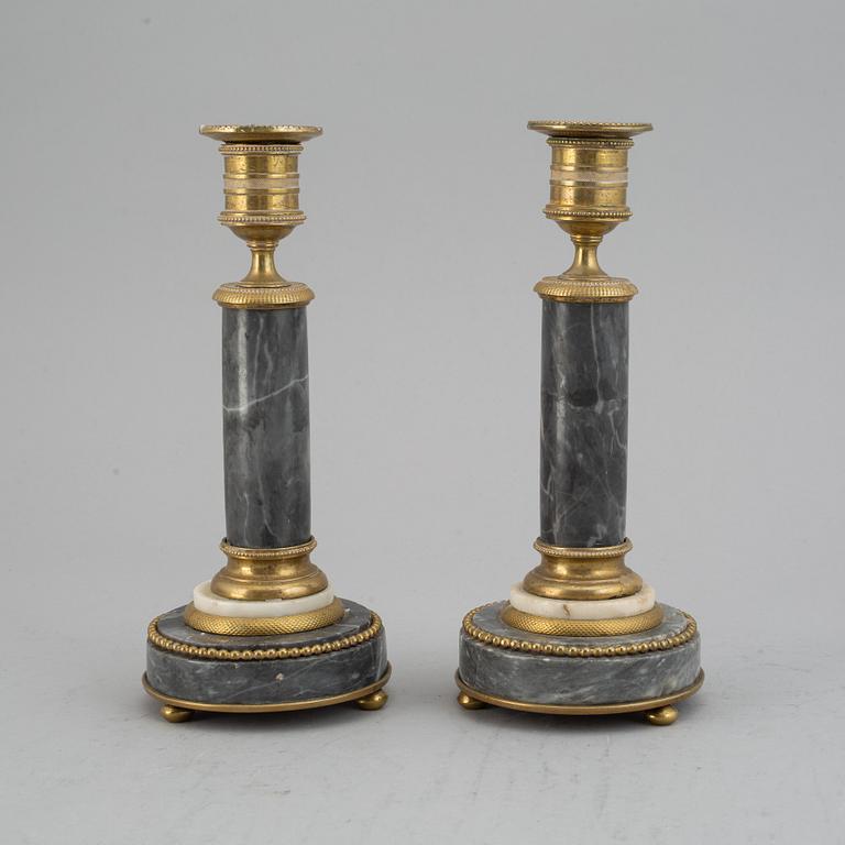 A pair of French ca 1800 candlesticks.