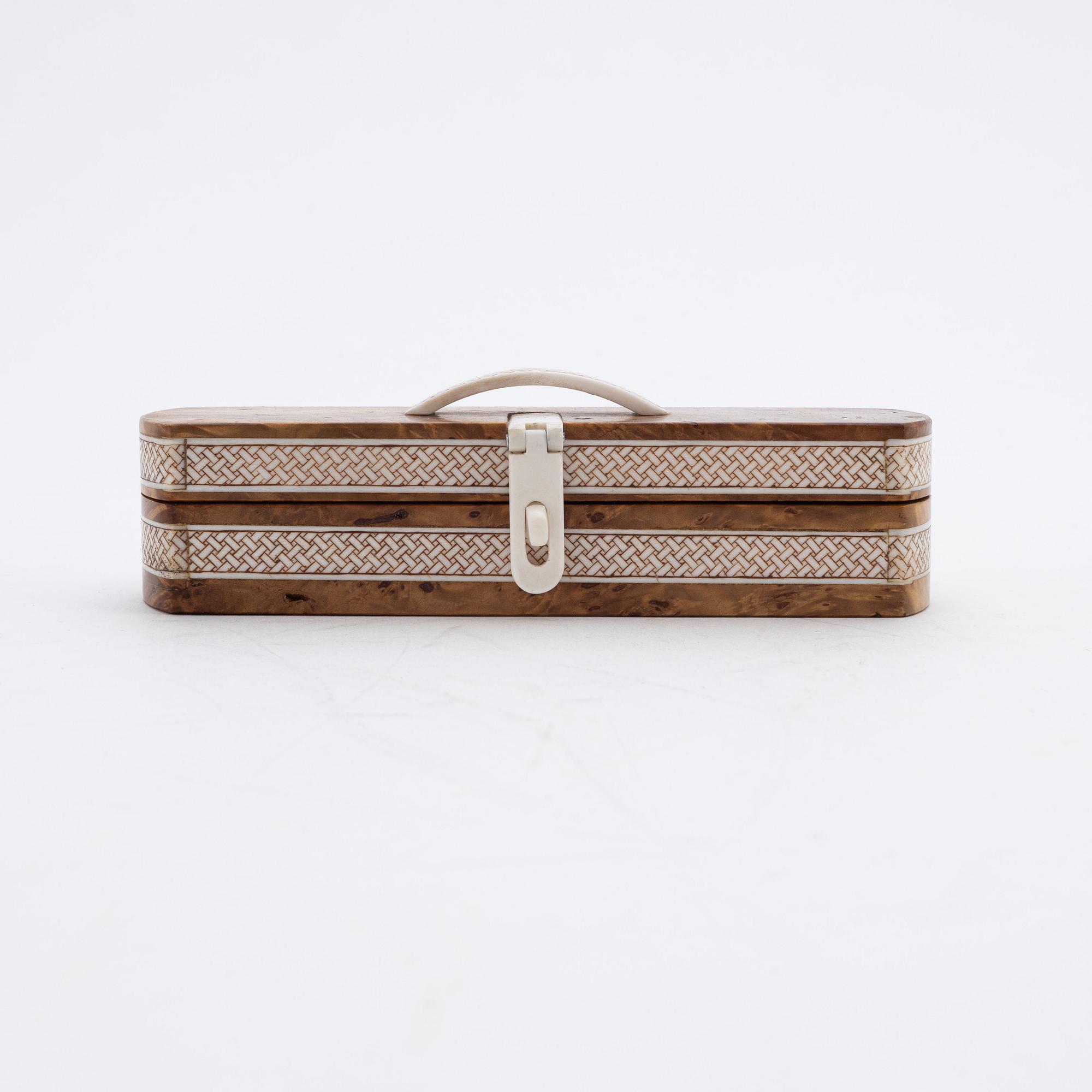 A reindeer horn knife in box by Bertil Fällman, dated 1996.