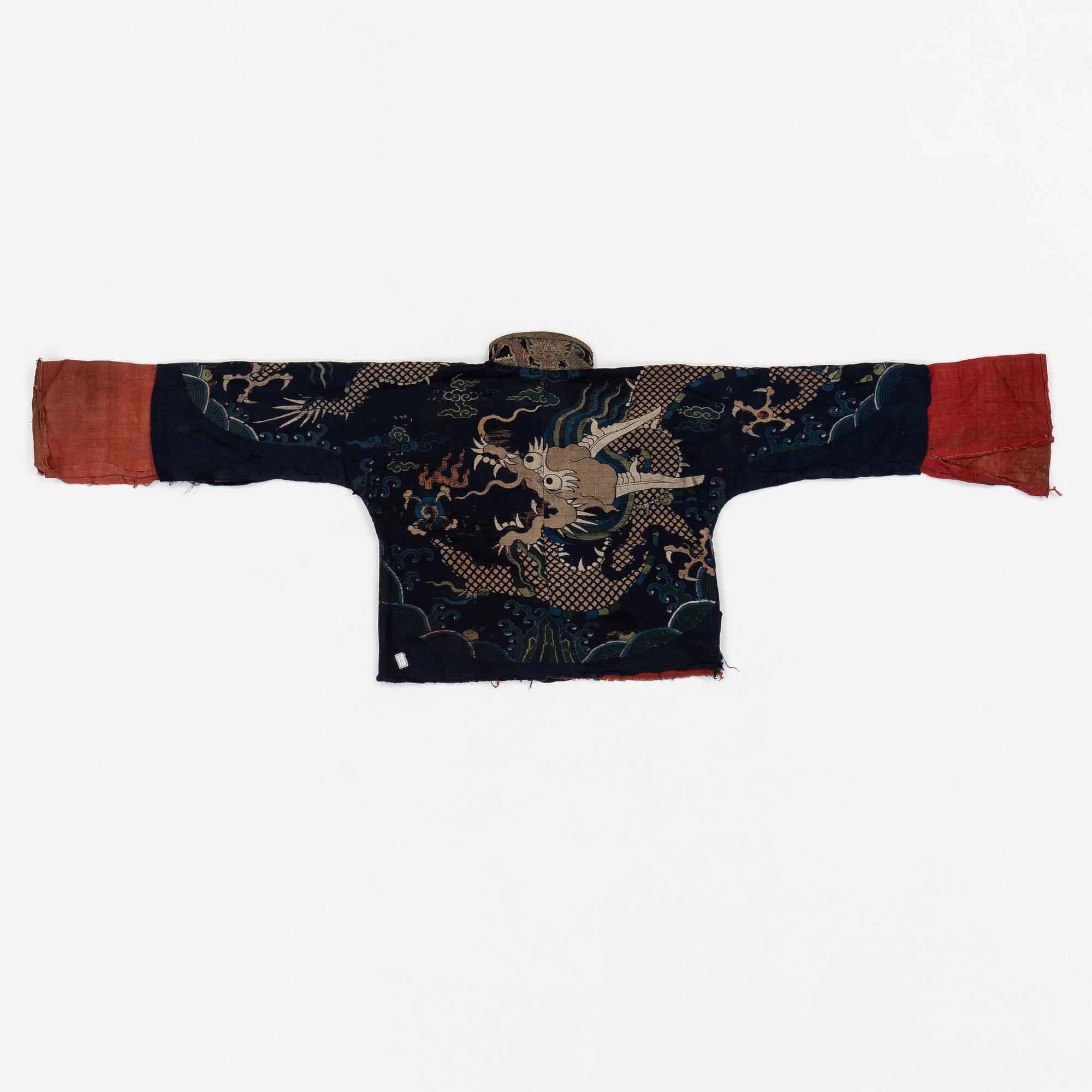 A rare fragment of a silk four clawed 'dragon' jacket, late Ming dynasty/early Qing dynasty.