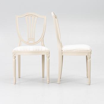 A dining table with 10 chairs, Gustavian Style dining suite, second half of the 20th century.