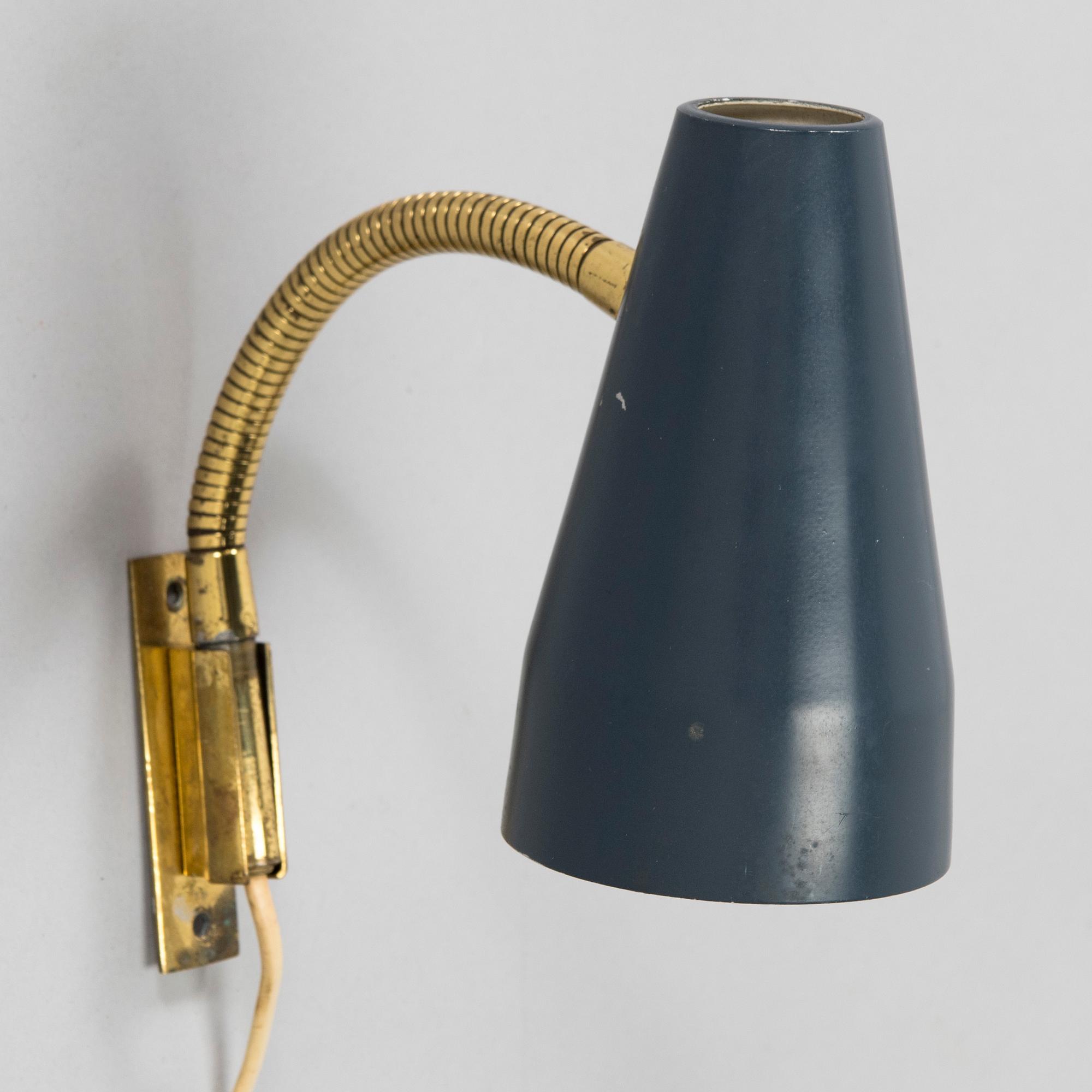 Lisa Johansson-Pape, a 1960's model '50-056' wall light for Stockmann Orno.
