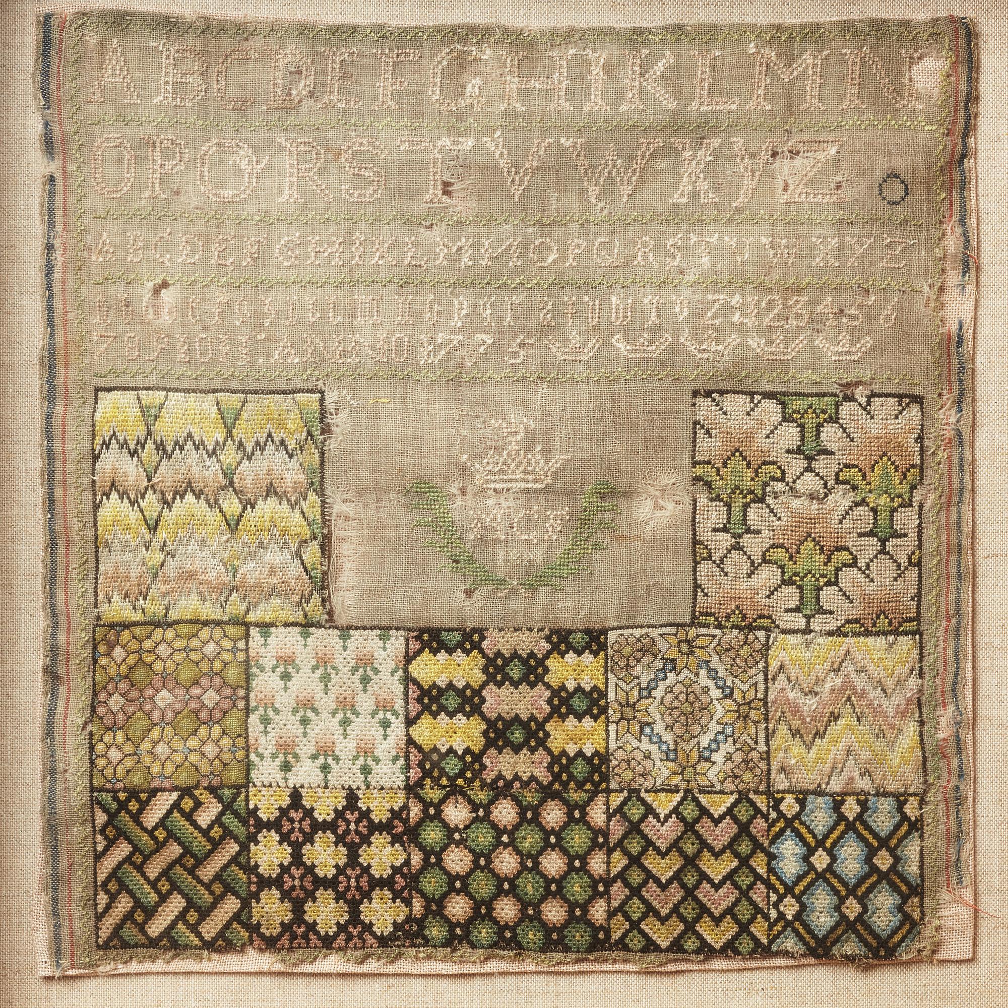 SAMPLER, embroidered, 33 x 32 cm, with the frame 44 x 43 cm, signed and dated MCF IBM 1775.
