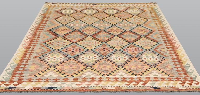 A Kilim rug, c. 249 x 169 cm.