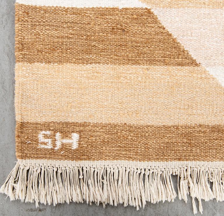 A flat weave carpet ca 240 x 170 cm.