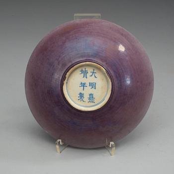 An aubergine glazed bowl, 17th Century with Jiajings six character mark.