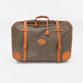 Mulberry, a scotch grain suitcase.