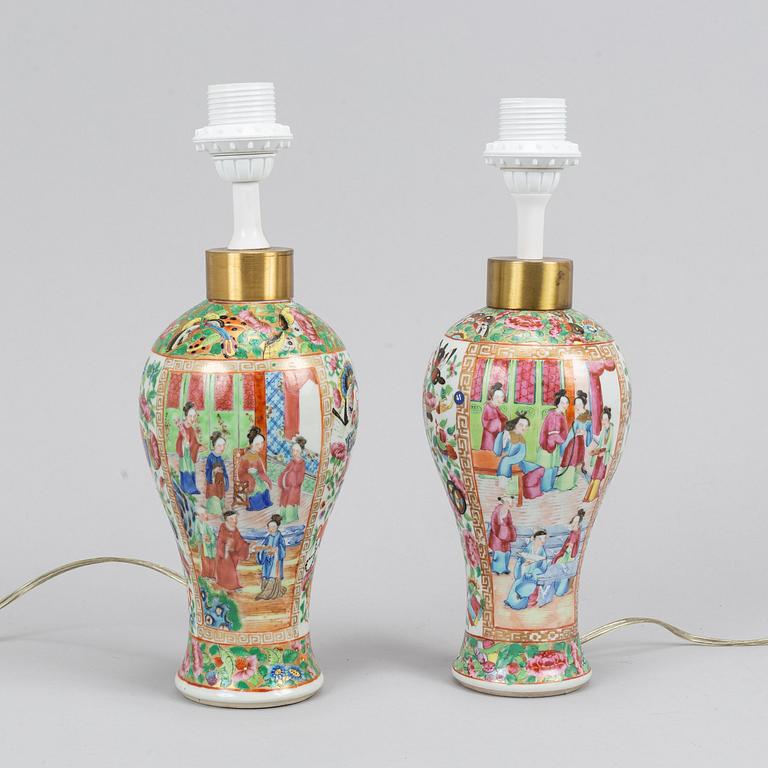 A pair of famille rose Canton table lamps and a pair of vases, late Qing dynasty, 19th Century.