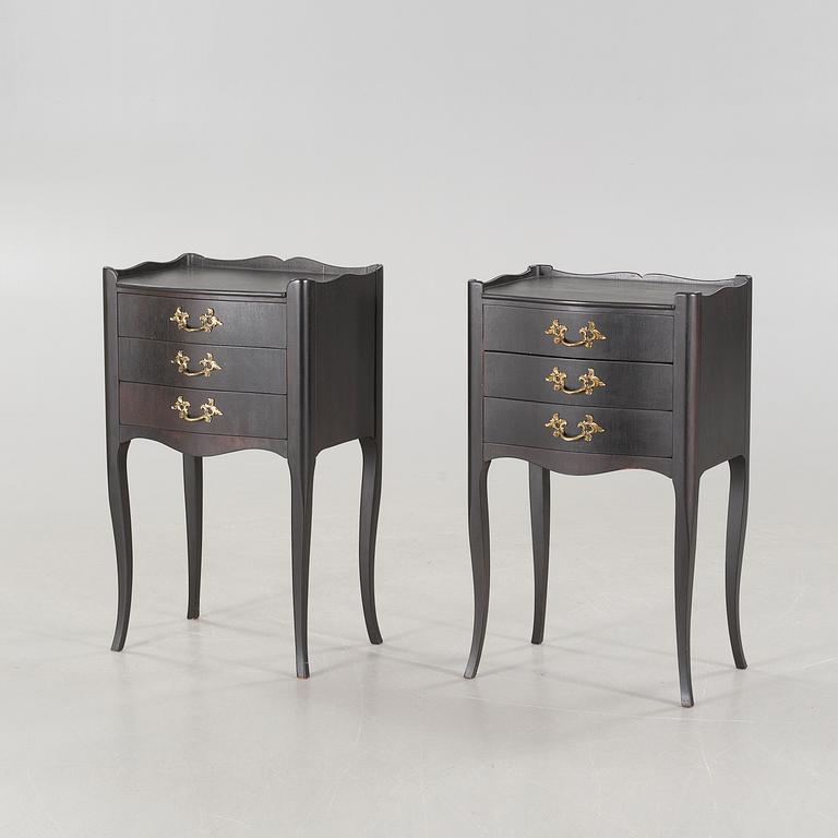 A pair of rococo style bedside tables from the second half of the 20th century.