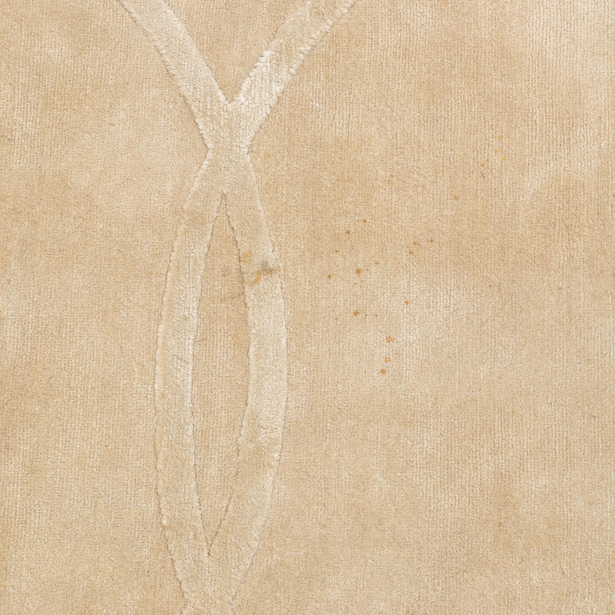 A carpet 360 x 360 cm.