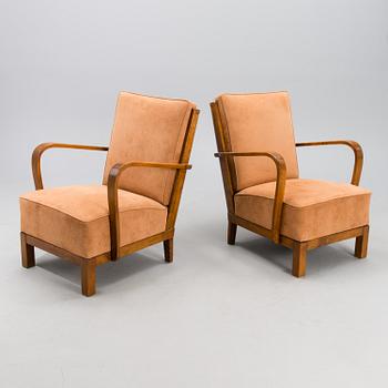 A pair of armchairs. "Panu" Asko.