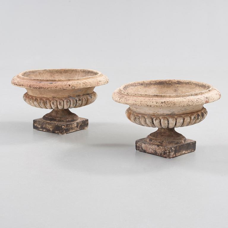 A pair of English 19th century stoneware garden urns.