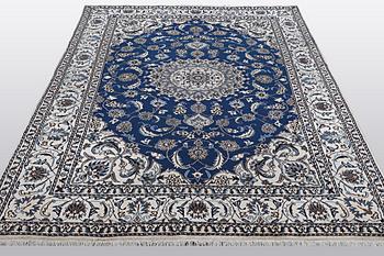 A carpet, Nain, part silk 9 LAA, ca 310 x 203 cm.