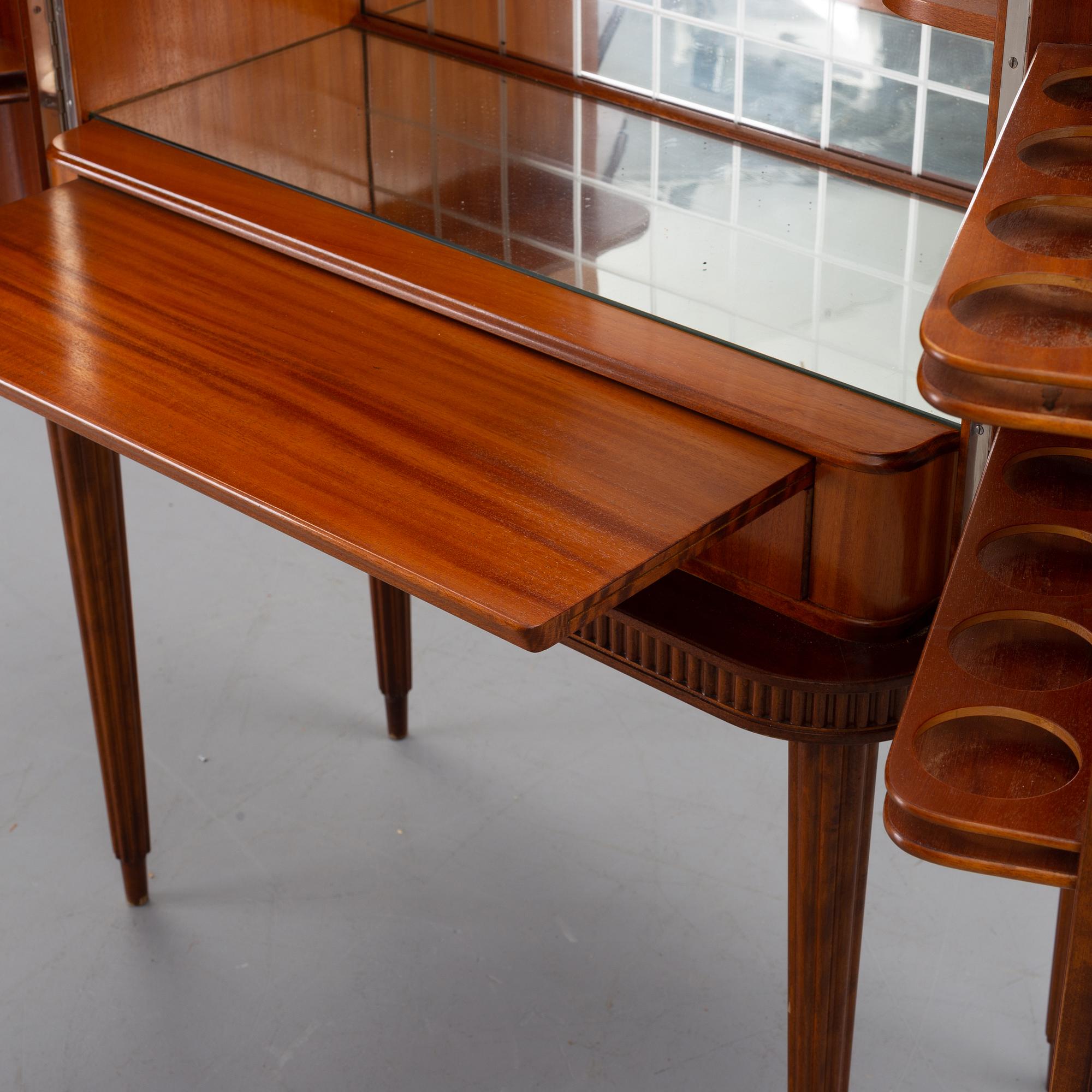 A mid 20th century drinking cabinet.