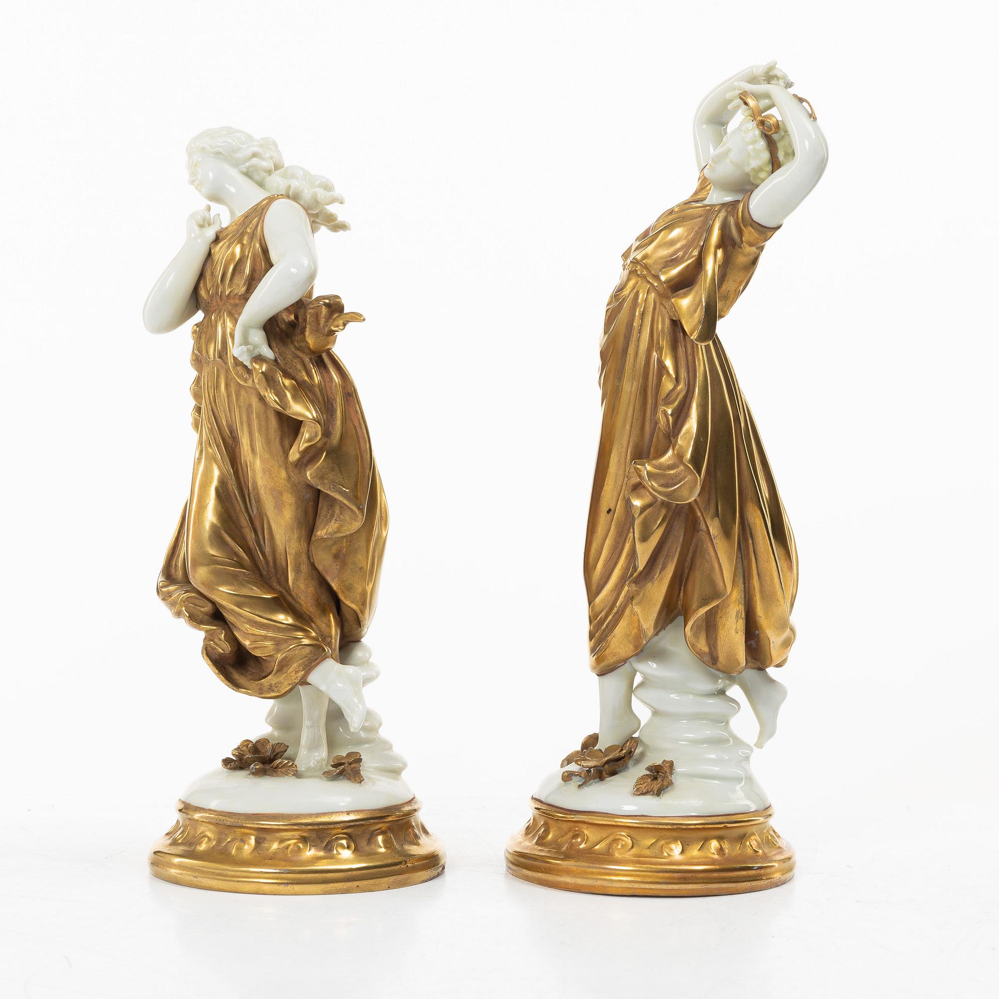 A pair of gilt "Muse" porcelain figurines, Volkstedt, first part of the 20th century.