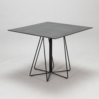 Lella and Massimo Vignelli, A "Paperclip" table in slate from Knoll 1994.
