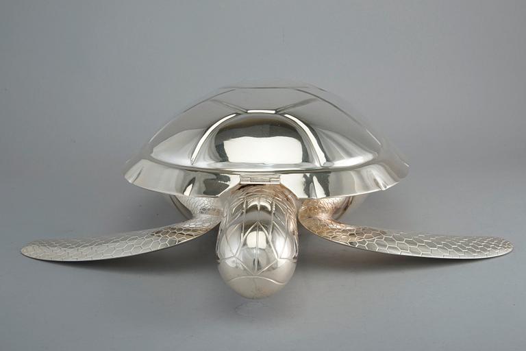 A SOUP TUREEN WITH LADLE, sterling silver, J. A.  Tarkiainen Helsinki 2000. Length 45 cm, weight 2248 g.