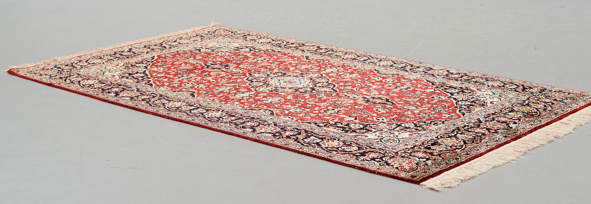 A rug, Old, silk Kashan, ca 224 x 138,5 cm.