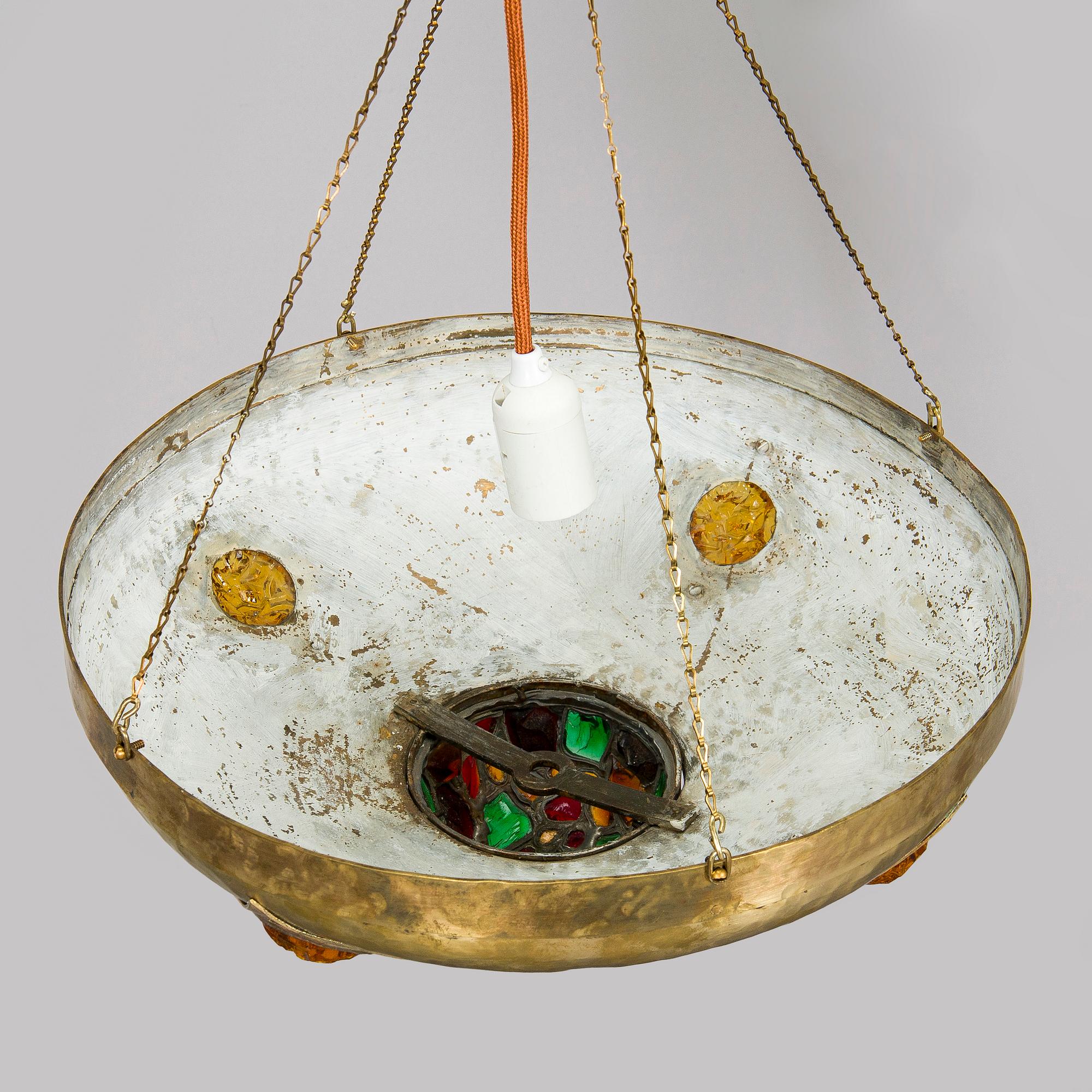 Kattovalaisin, 1900-luvun alku.