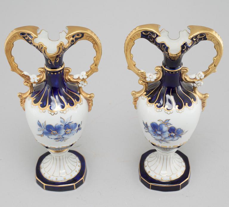 A pair of porcelian vases by Royal Dux, from the latter half of the 20th century.