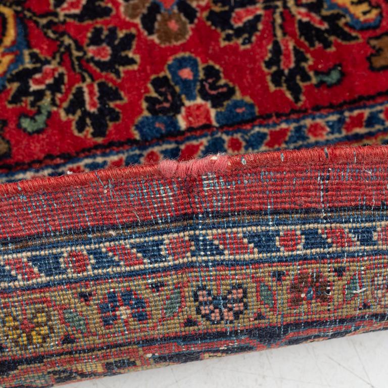 An American Sarouk rug, semi antique, c. 200 x 133 cm.