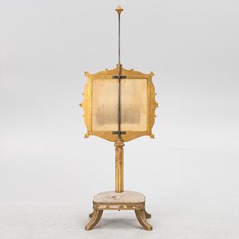 Brasskärm med fotpall, omkring 1900.