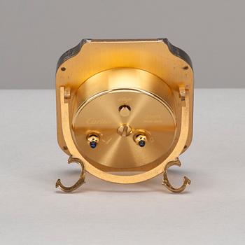 A CARTIER TABLE CLOCK, steel with gidt decoration, late 20th century.