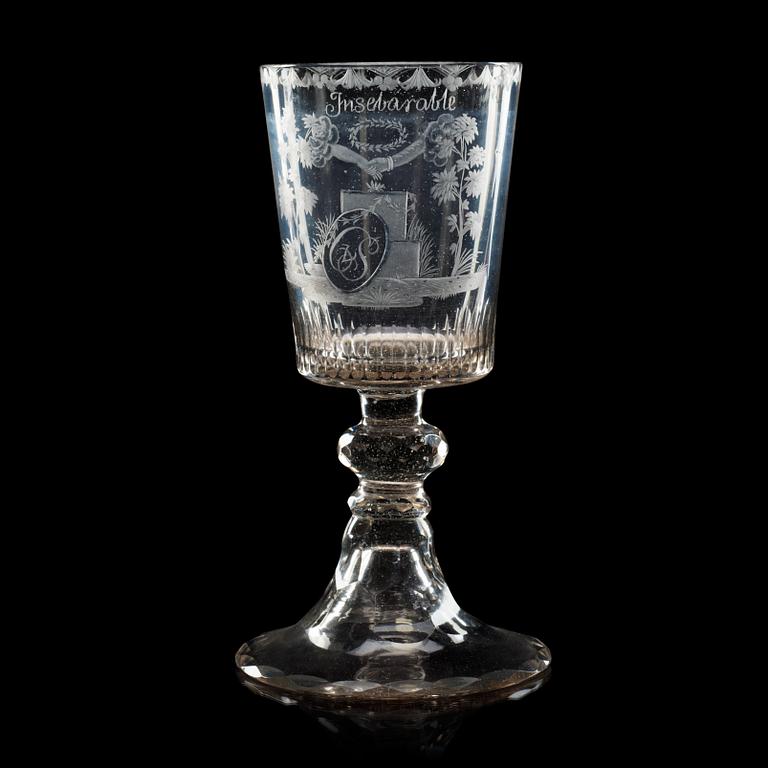 An engraved wine goblet, England, early 19th Century.