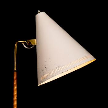 A mid-20th century 'K10-10' standard lamp for Taito, Finland.