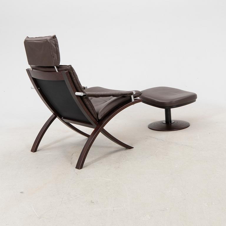 Åke Fribyter, an armchair and fotstool by Nelo, Knislinge, second half of the 20th Century.