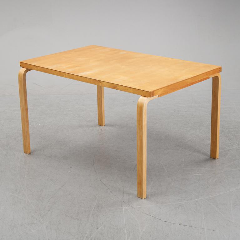Alvar Aalto, a birch dining table, Artek, Finland, mid 20th Century.