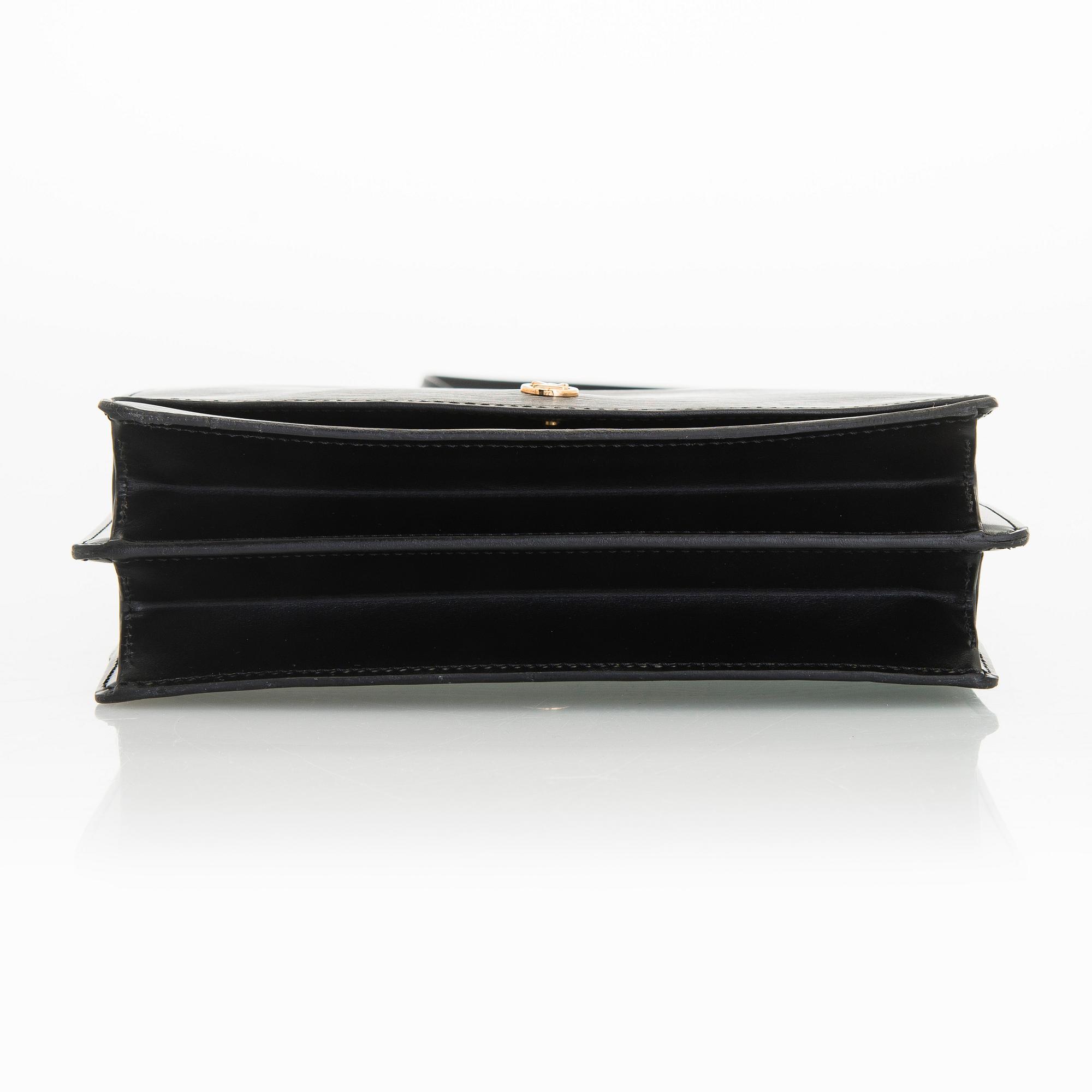 Louis Vuitton, a 'Grenelle' bag.