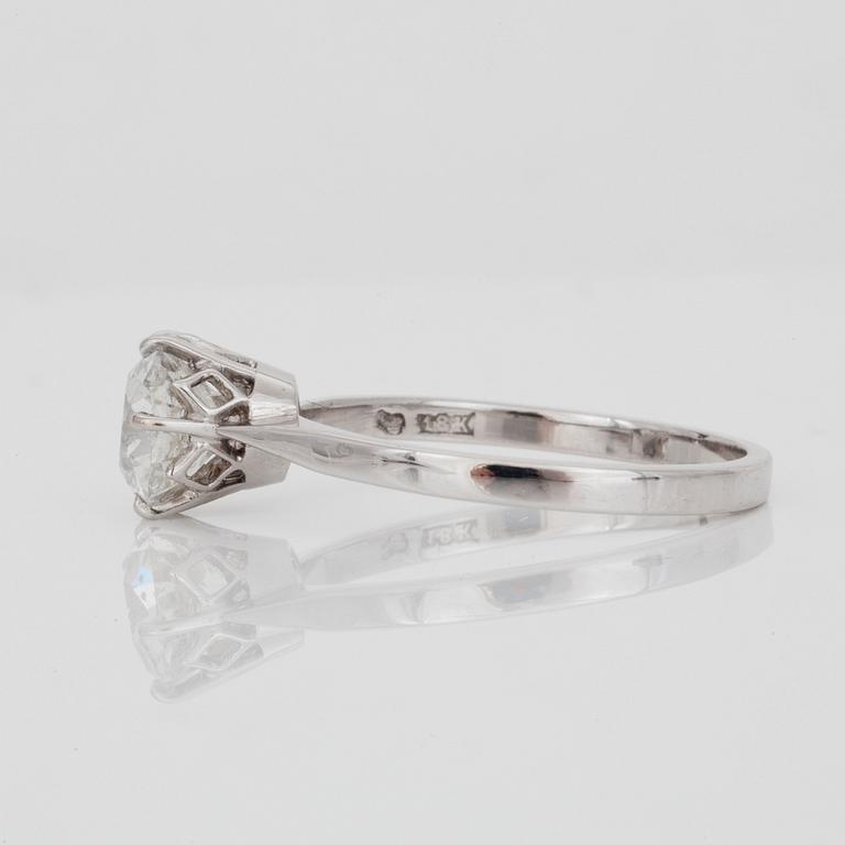 An old cushion-cut diamond solitaire ring.