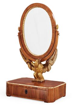 584. A Swedish Empire table mirror, 19th Century.