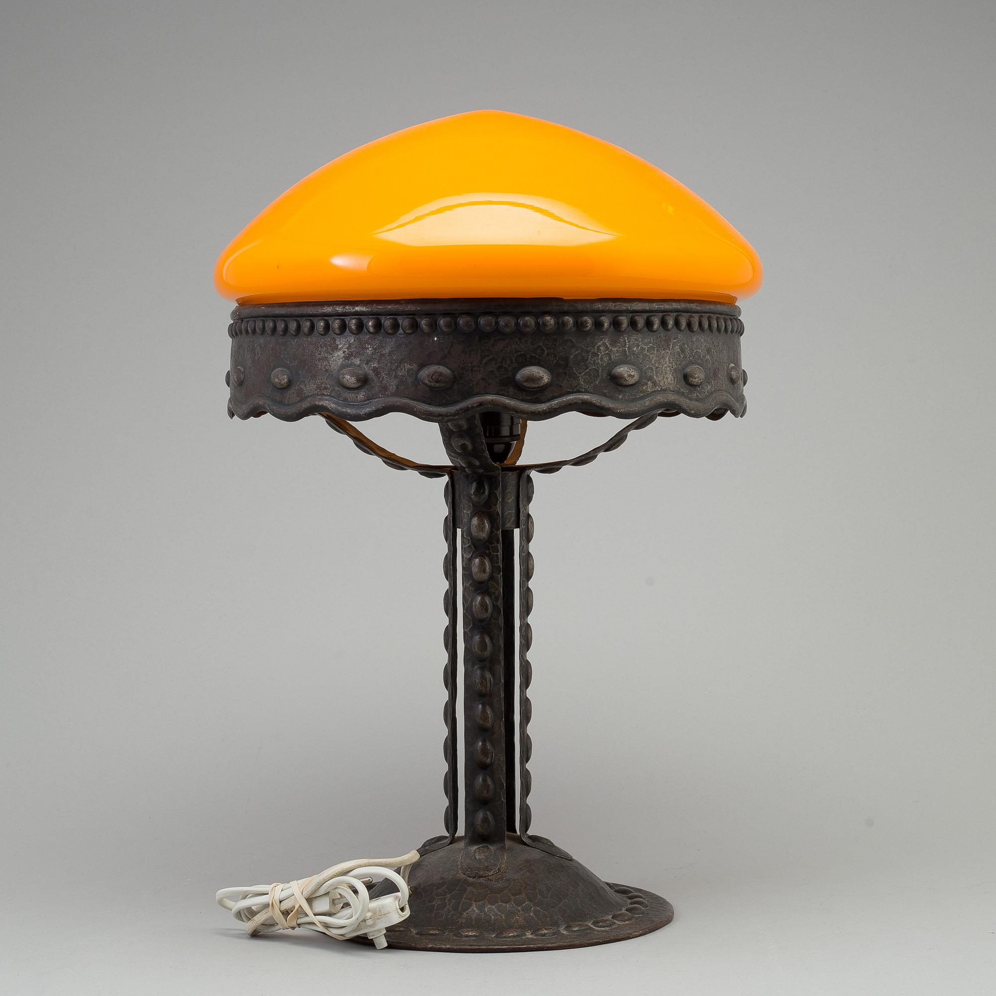 A early 20th century metal table light.