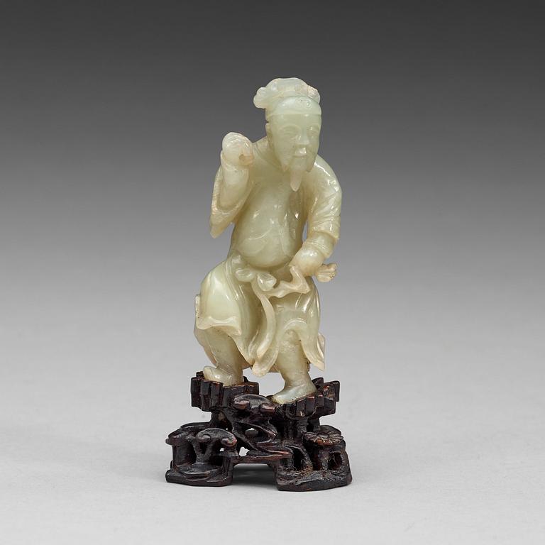 A nephrite sculpture of a man, Qing dynasty (1644-1912).