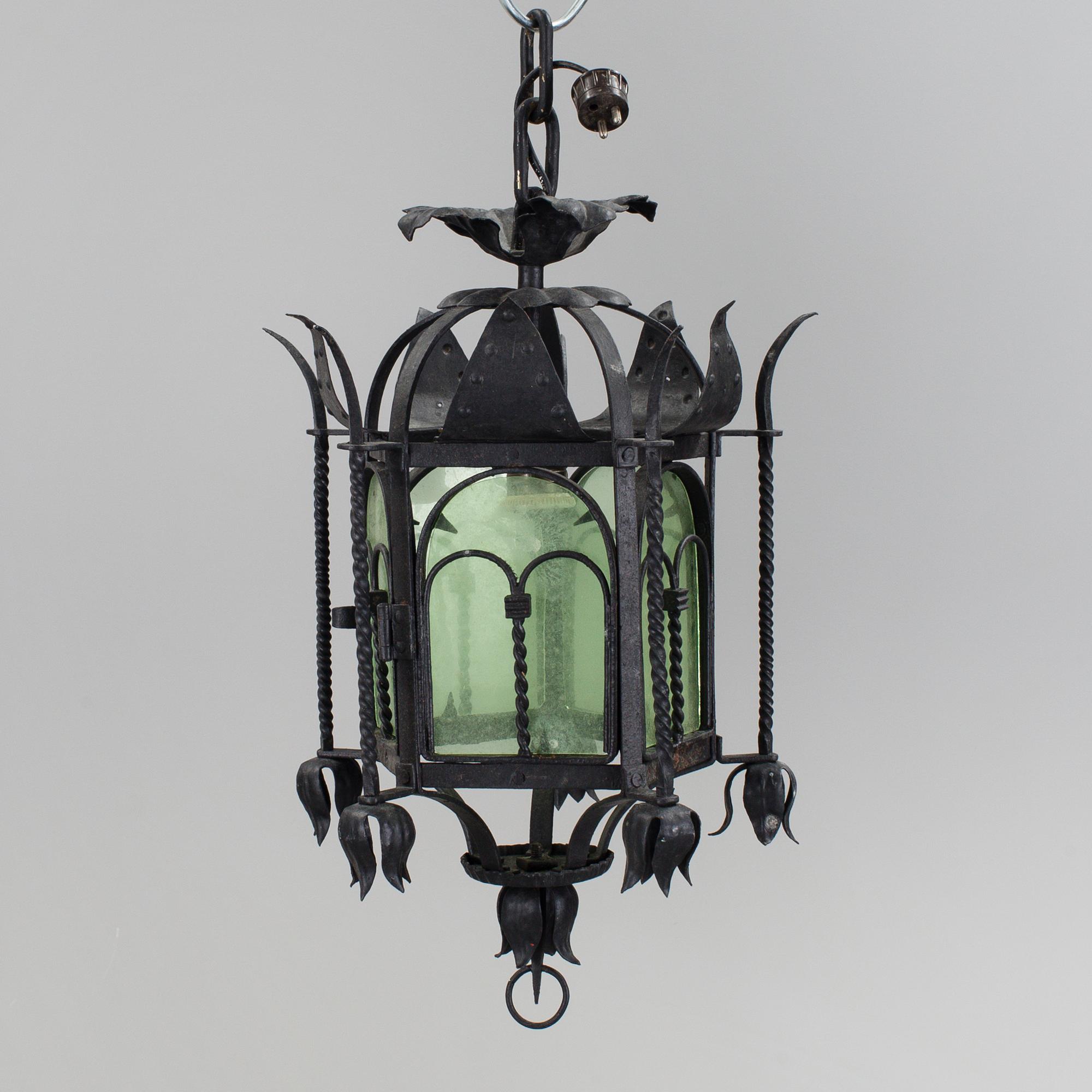 A wrought iron ceiling light first half of the 20th century.