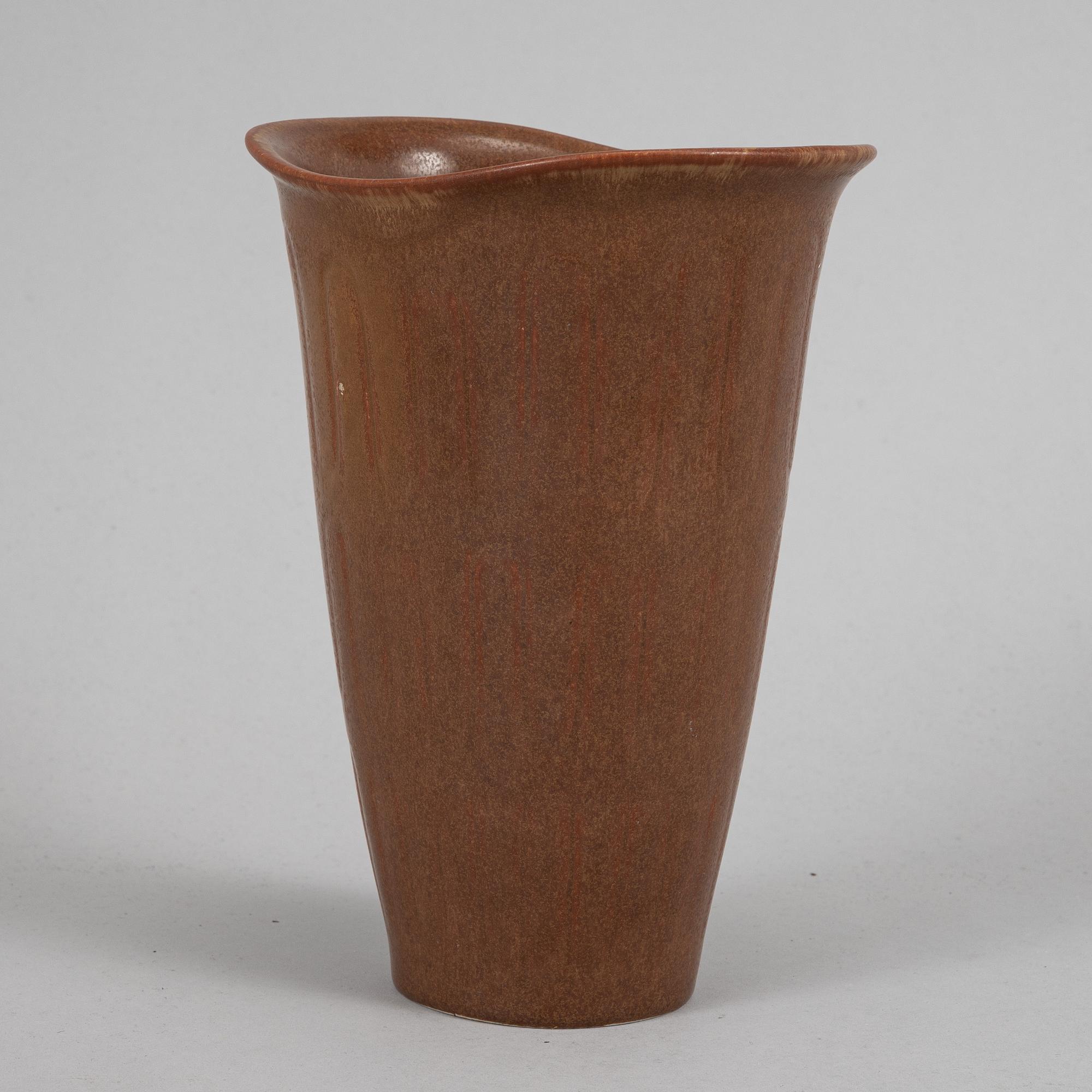 Tea pot, two bowls, two creamers, and a vase by Gunnar Nylund, stoneware, Rörstrand.