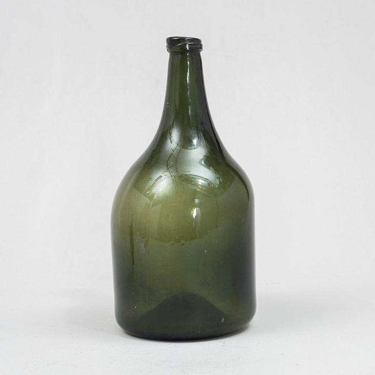 A glass bottle, 18th century.