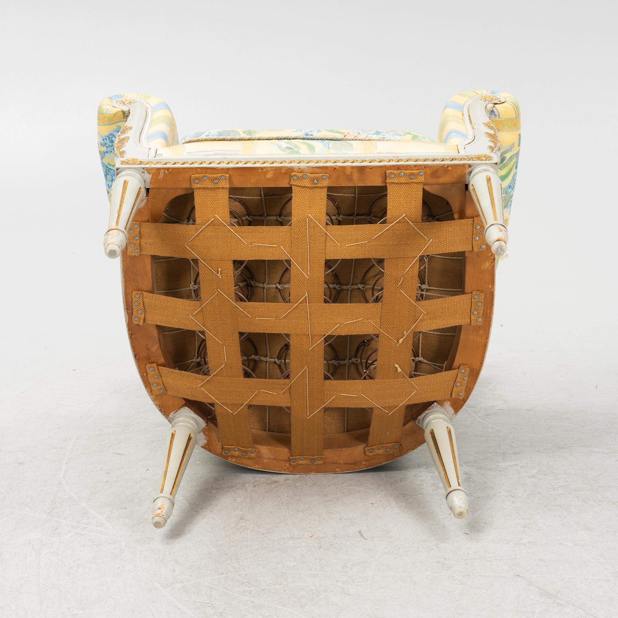 A Louis XVI style armchair, 20th Century.