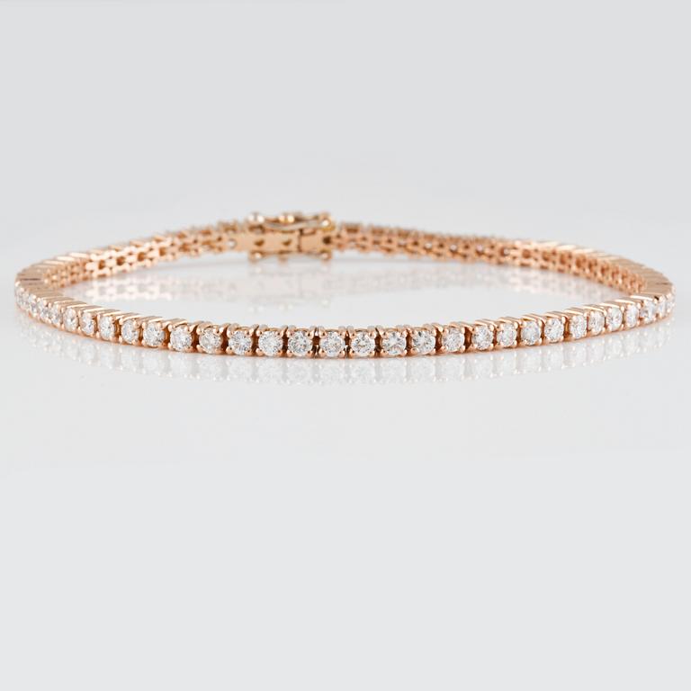 ARMBAND, 18K roséguld med briljantslipade diamanter ca 2.99 ct. Vikt 9,9 gram.