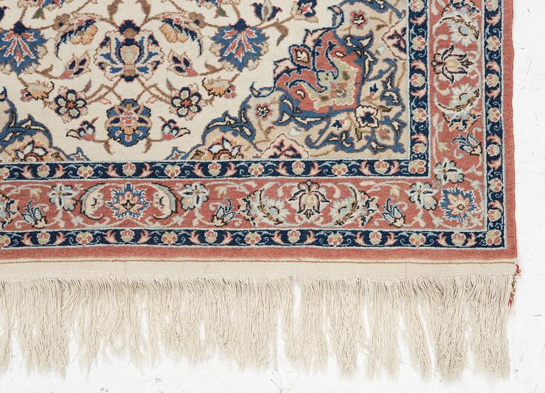 An Oriental rug, approx. 143 x 107 cm.