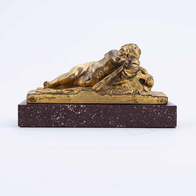 A porphyry and ormolu paperweight, possibly French, late 19th century.