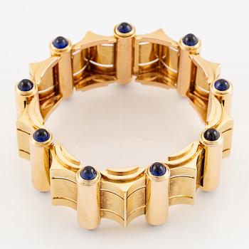 An 18K gold Retro bracelet.