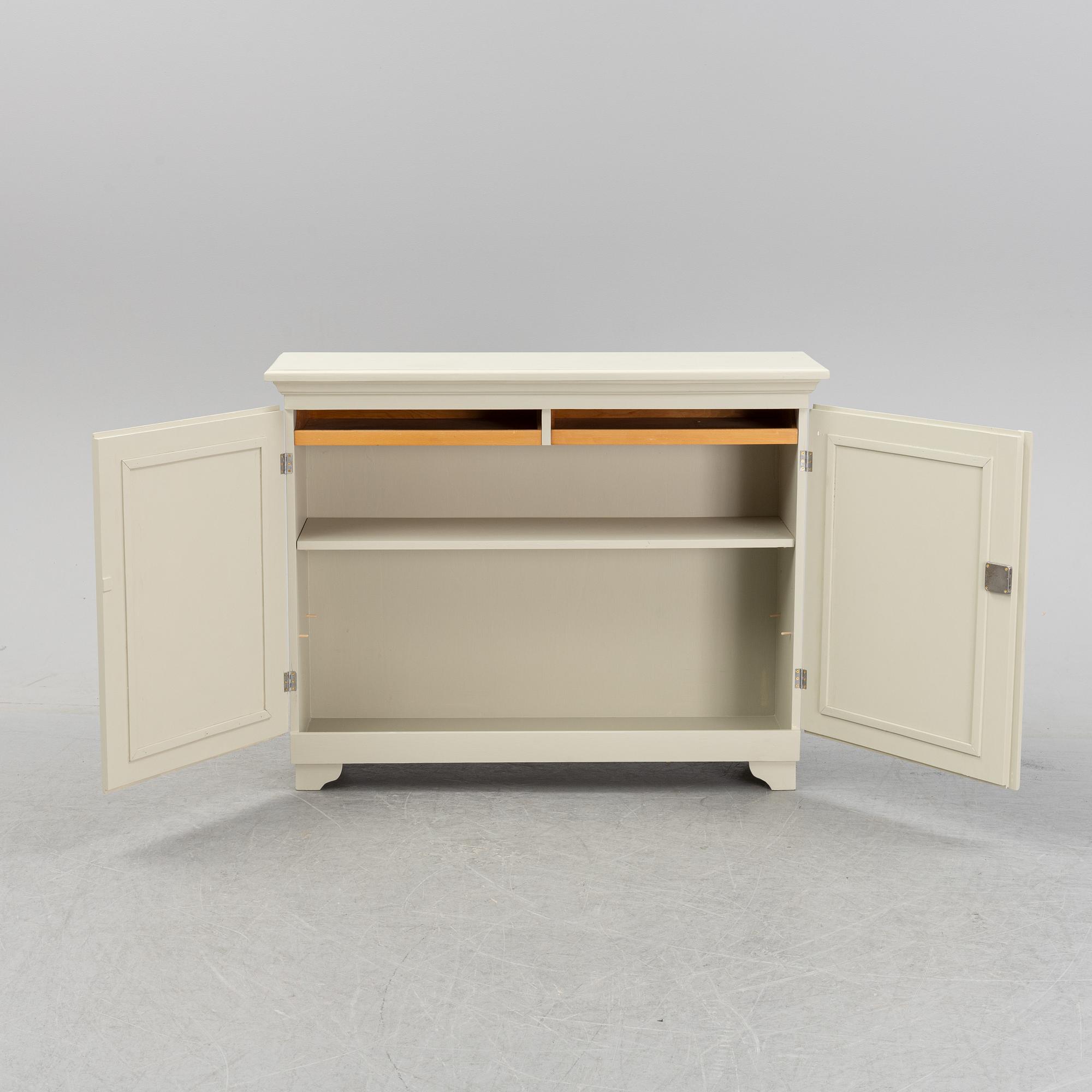 A painted 20th Century cupboard.